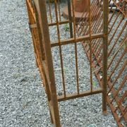 Garden arch with wrought iron gate