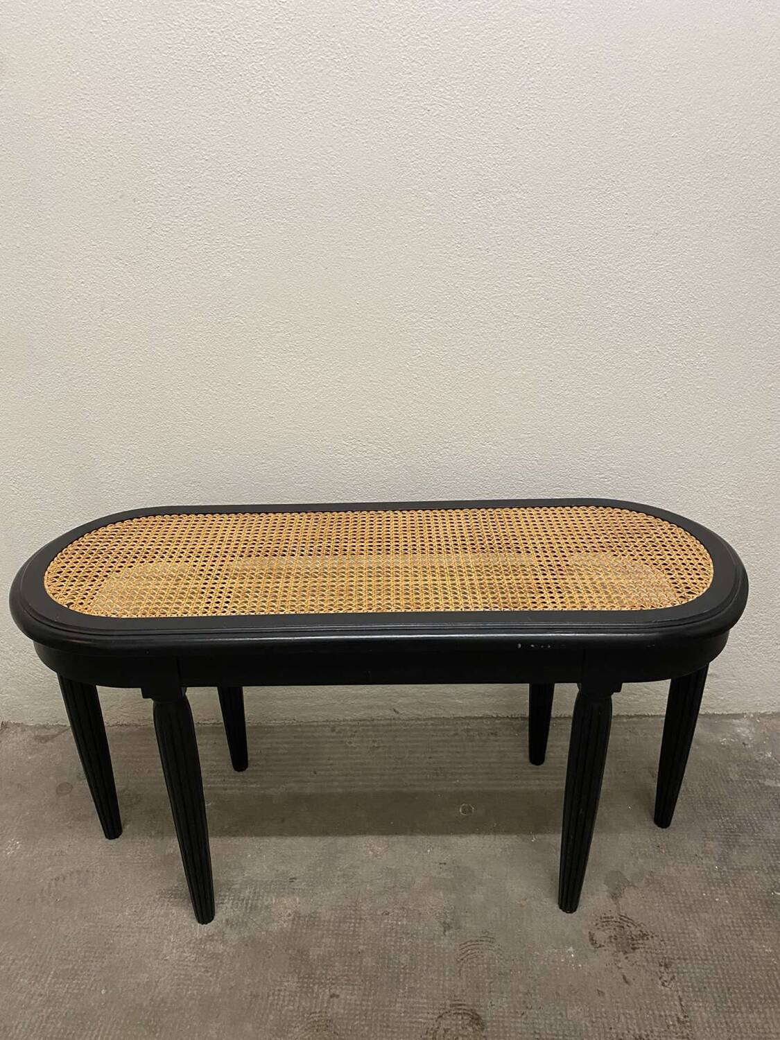 Rattan piano bench