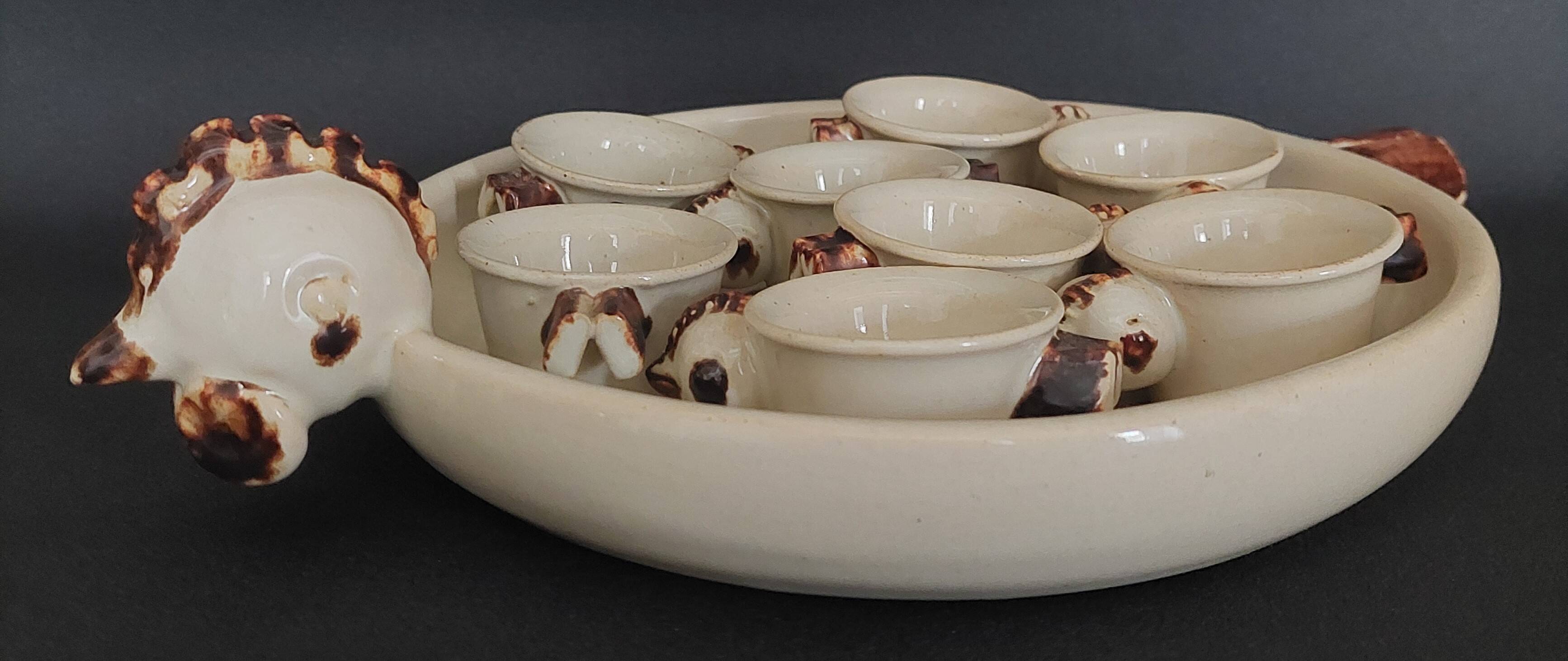 Egg cups with servant, series of eight stoneware signed arts ceram grand feu XX