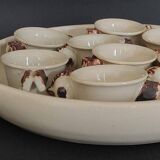 Egg cups with servant, series of eight stoneware signed arts ceram grand feu XX