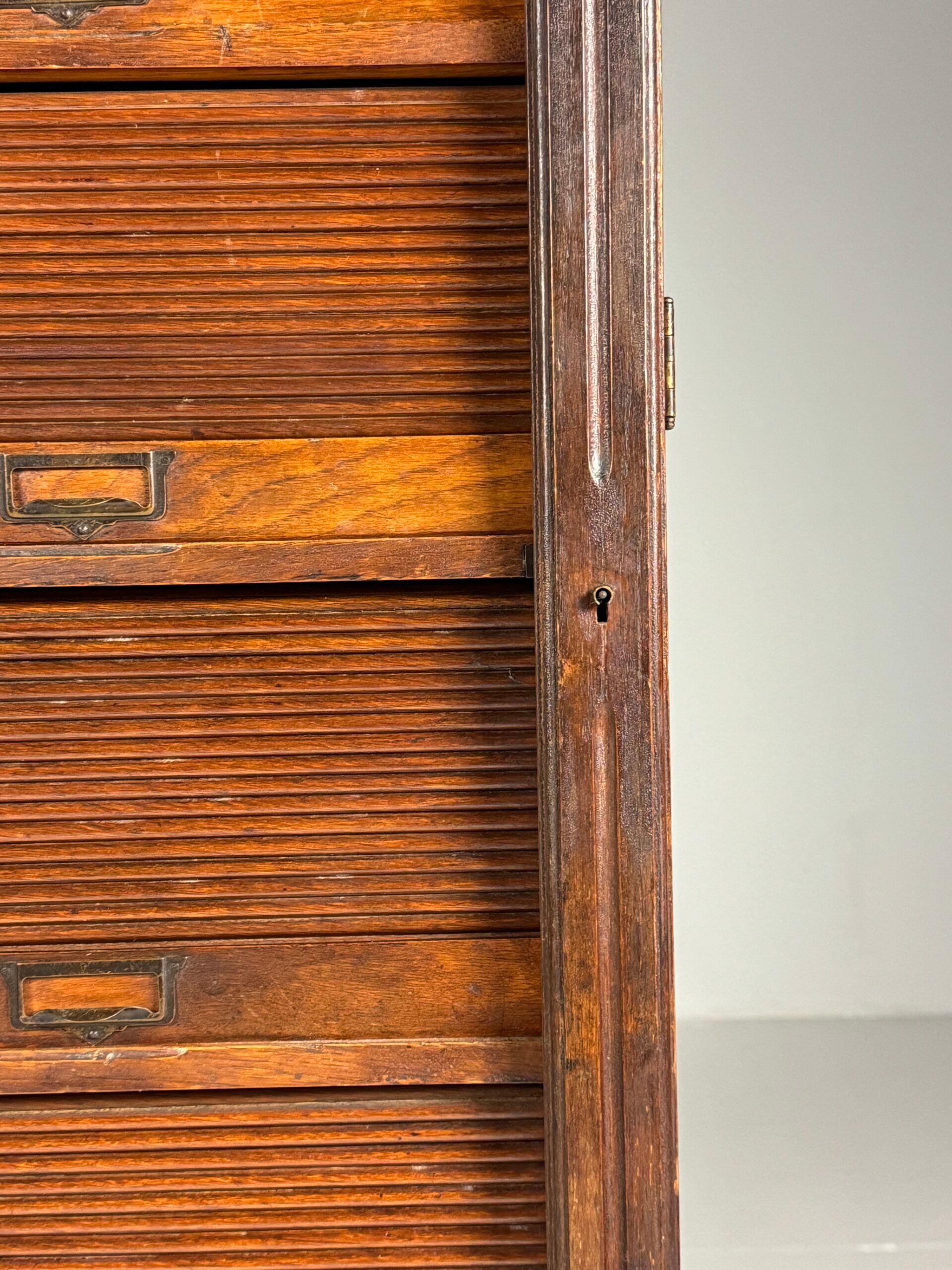 Antique archive cabinet with roller doors