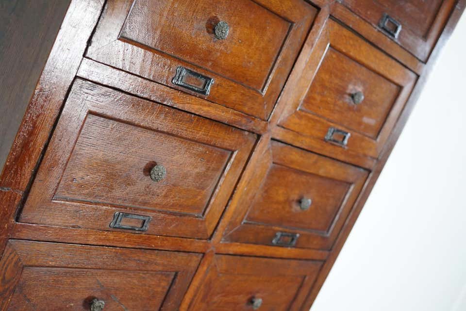 1870s oak apothecary cabinet