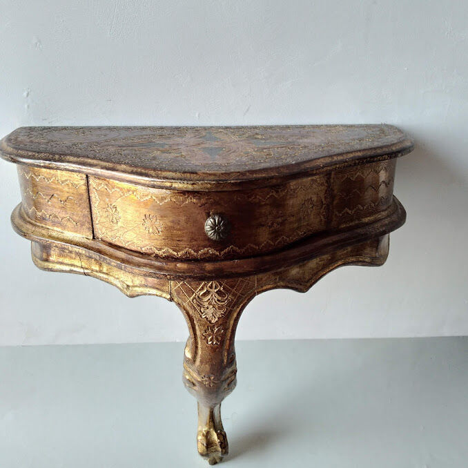 Small golden florentine console