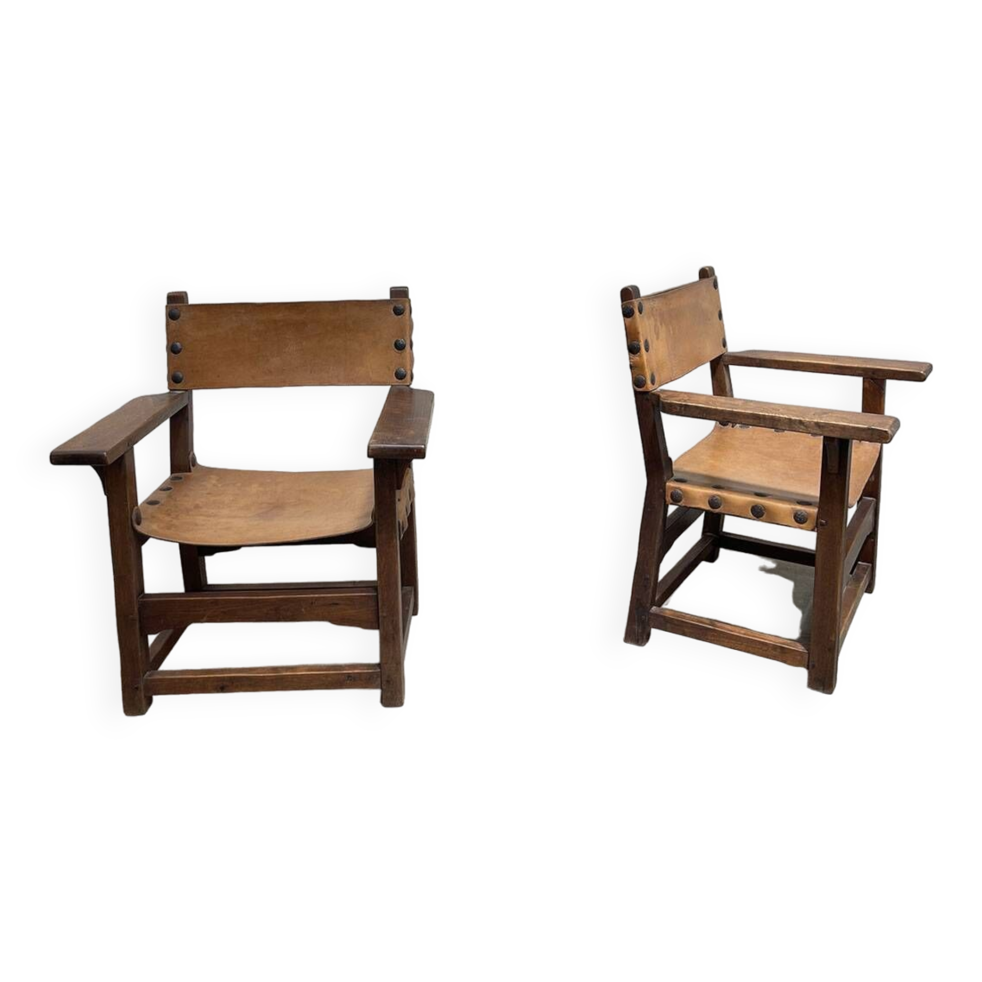 Pair of leather and walnut armchairs from the 1950s