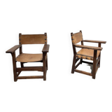 Pair of leather and walnut armchairs from the 1950s