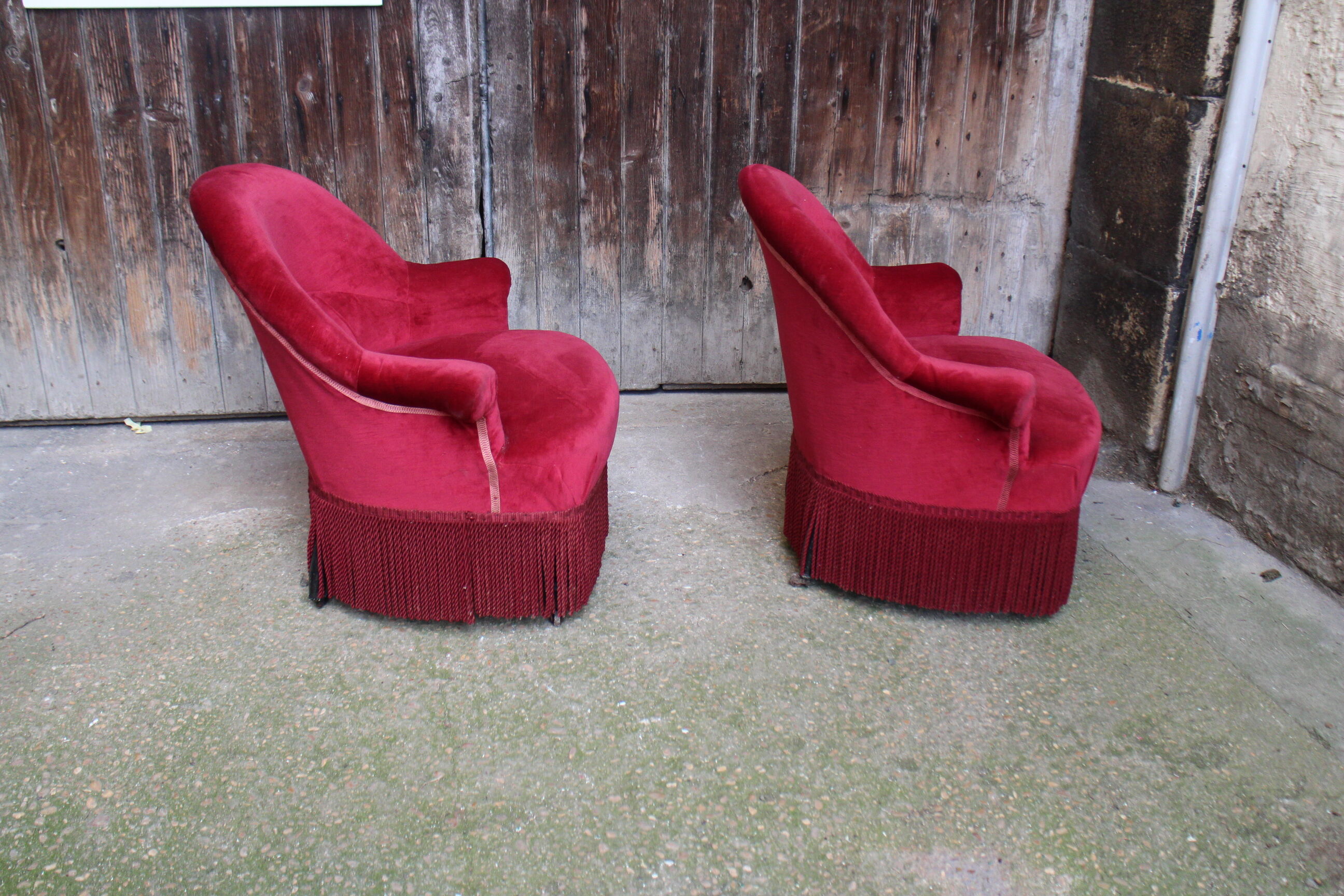 2 red velvet toad armchairs