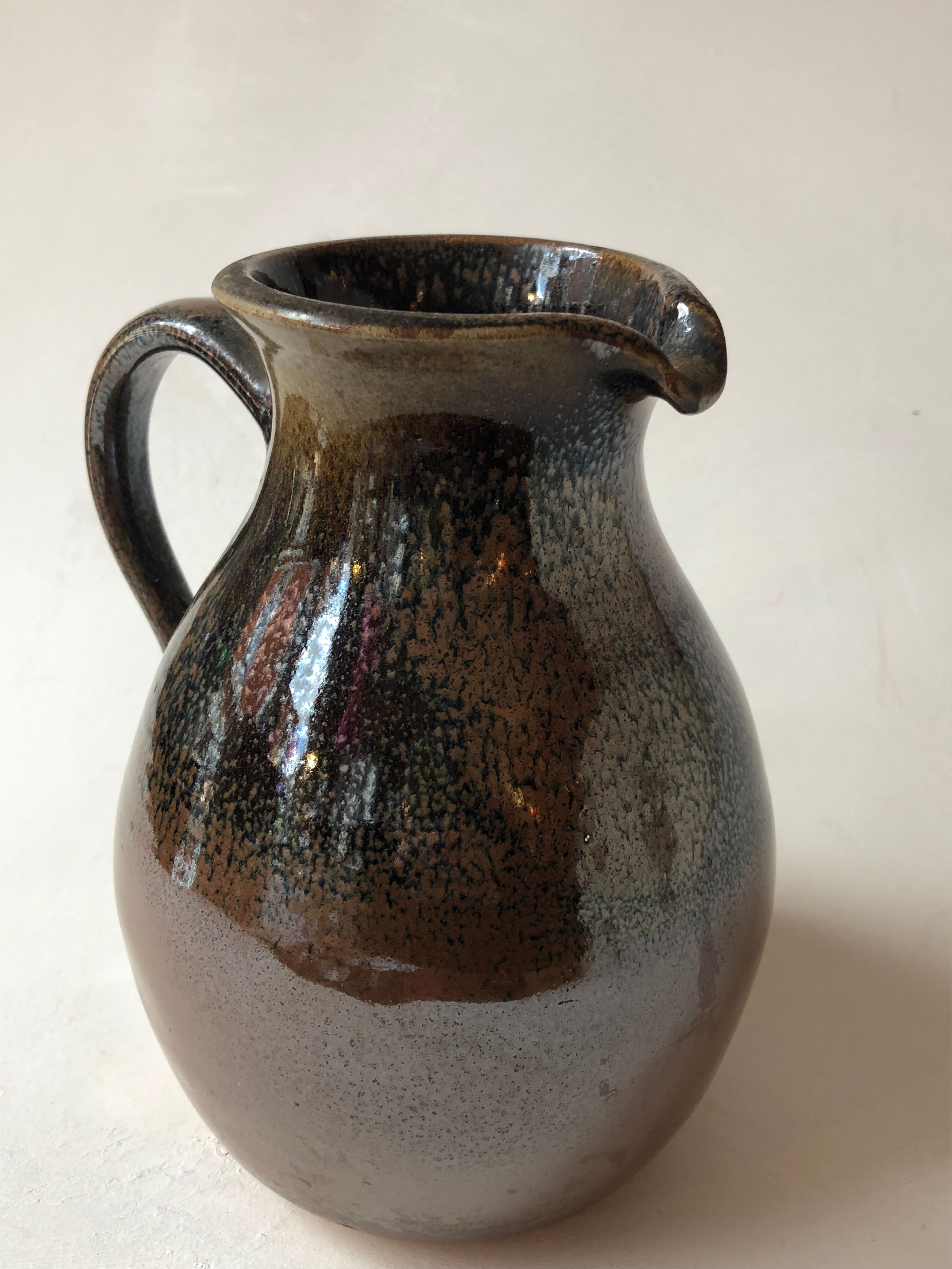 Glazed stoneware jug signed "KD".