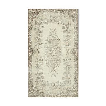 Anatolian handwoven antique 1980s beige rug 181 cm x 320 cm