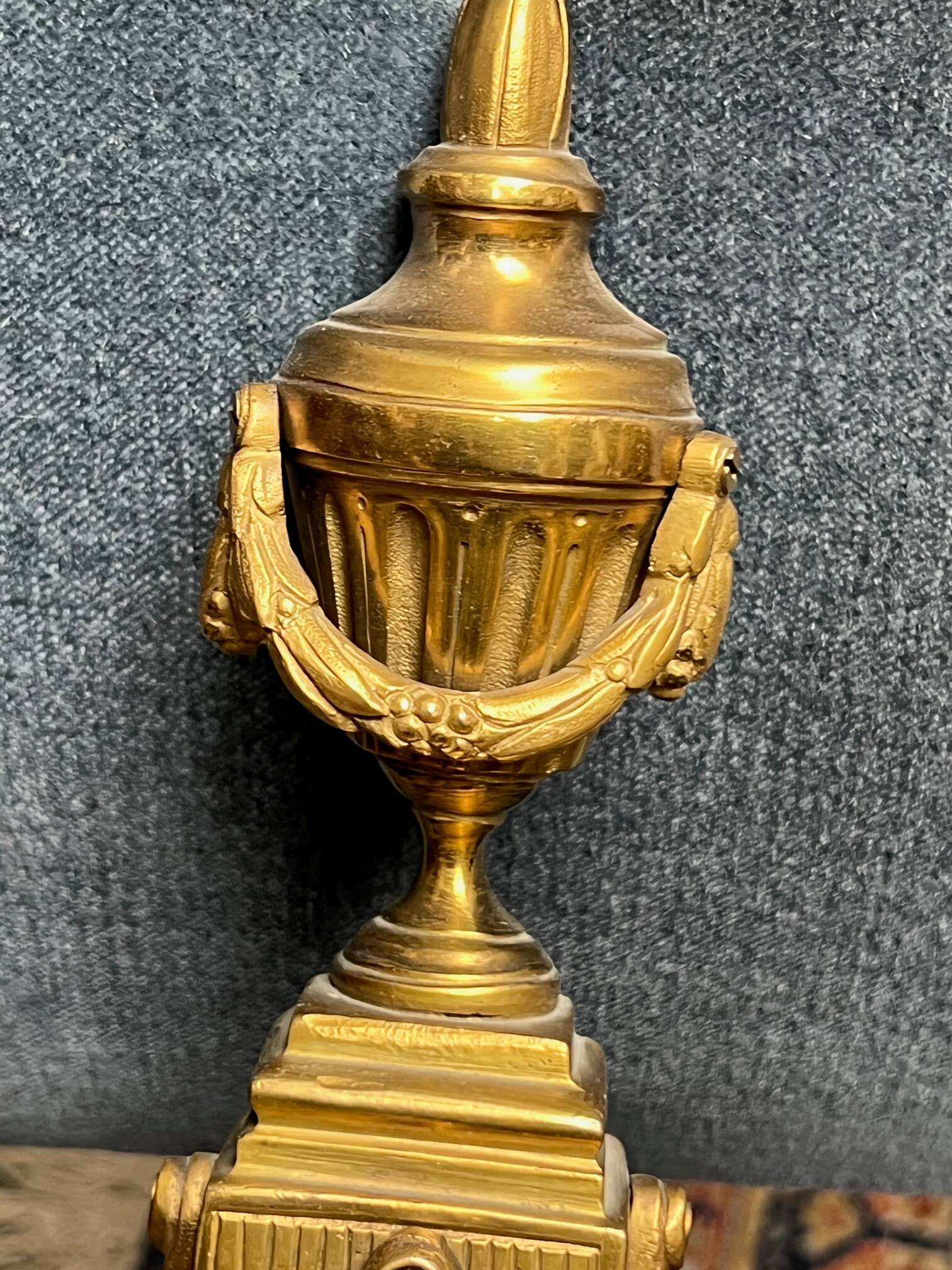 Pair of wall lights. Solid gilded bronze.