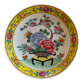Yellow porcelain plate with saturated and vivid colors. Handmade in Japan