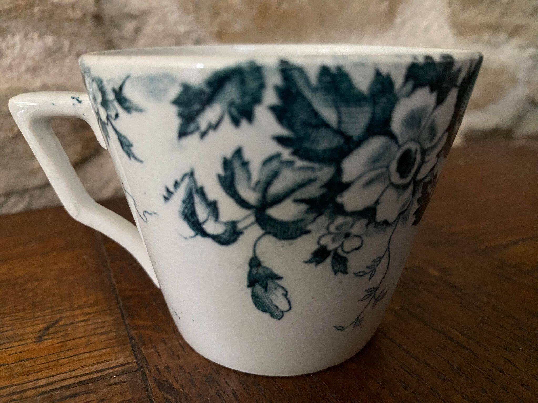 Cup and saucer in Iron Earth St Amand and Hamage Marie Louise