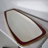 Miroir mural design années 1950 à forme libre avec bordure dorée