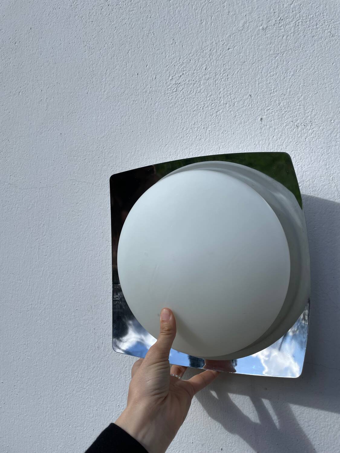 White glass and stainless steel ceiling light