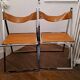 2 Chromed metal and leather folding chairs. 70s. Fontoni & Geraci
