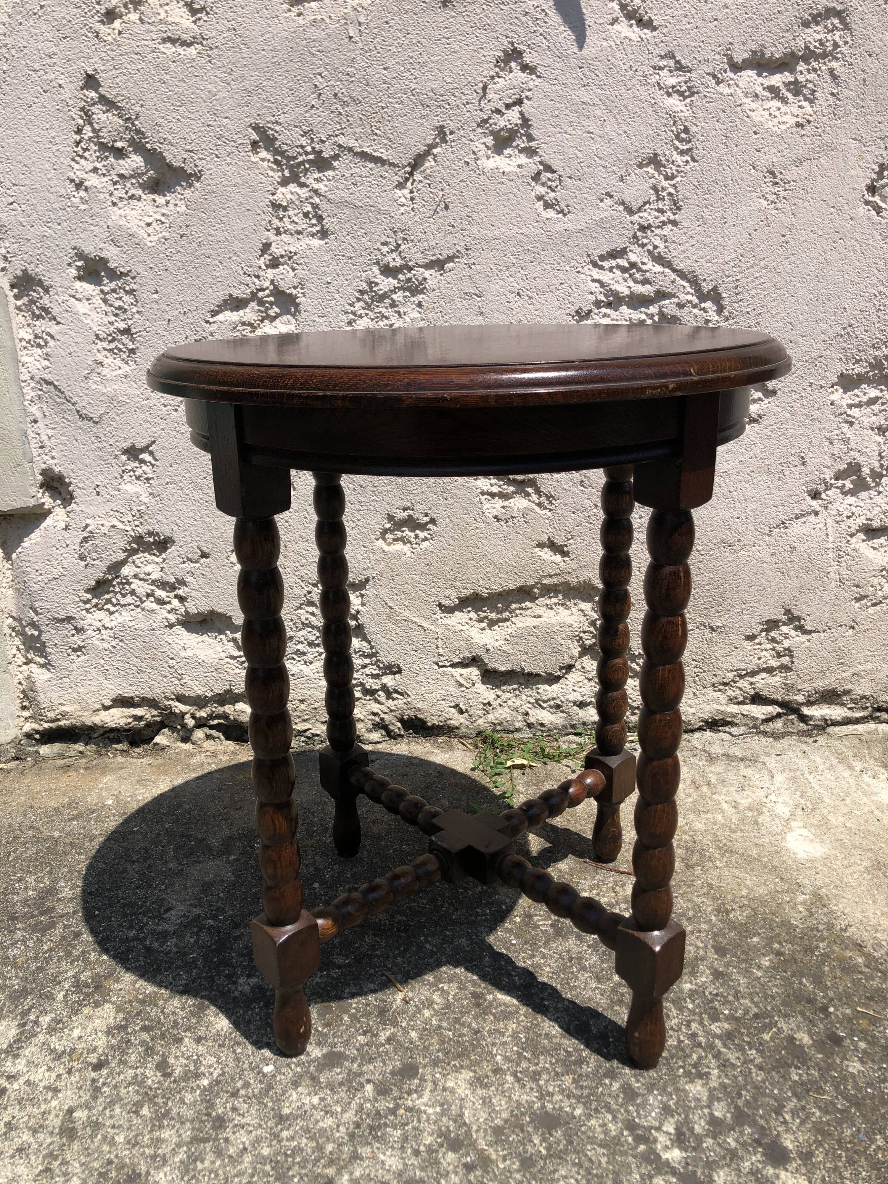 Dark turned wood side table