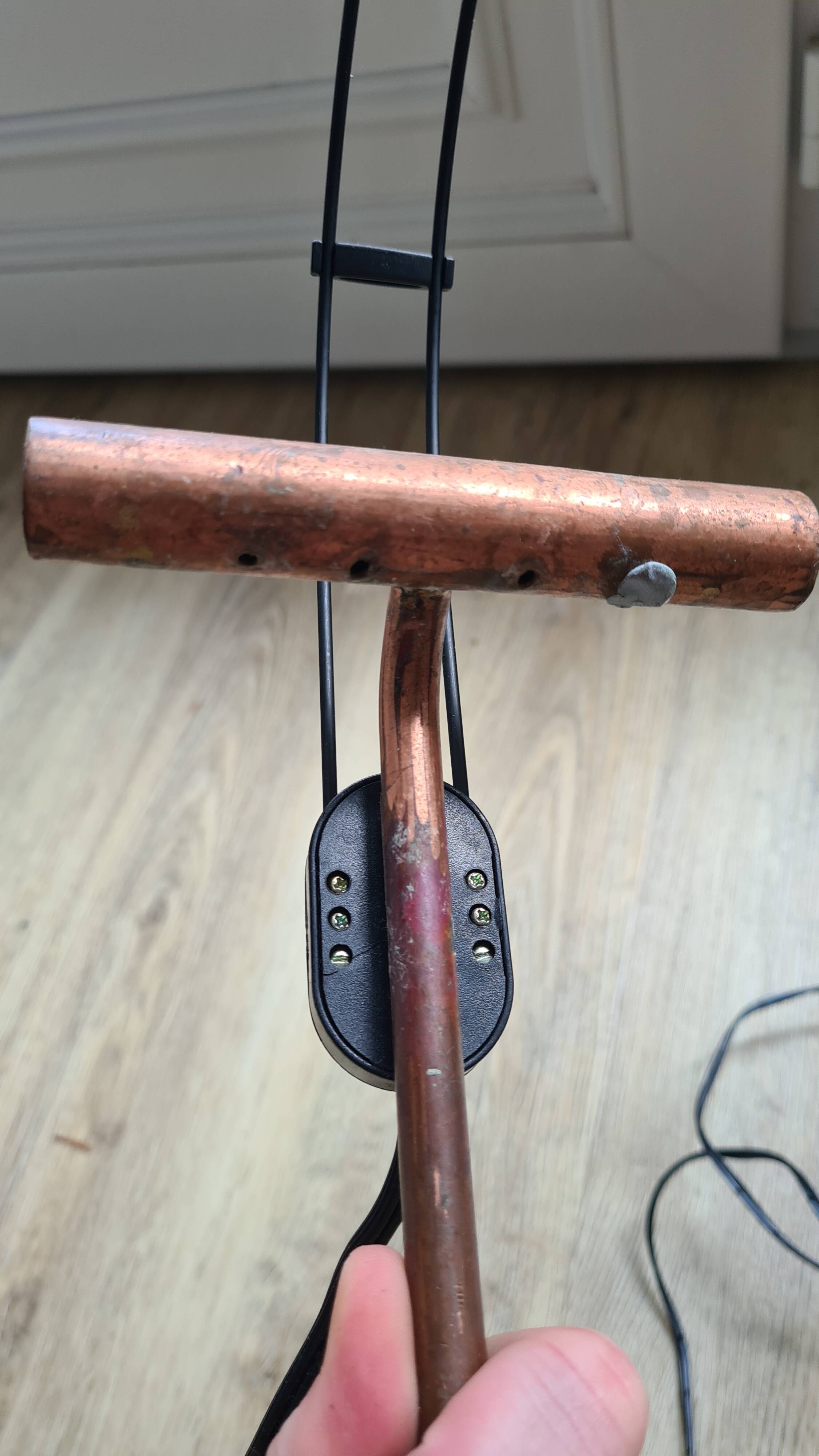 old lamp with stone base and copper arm