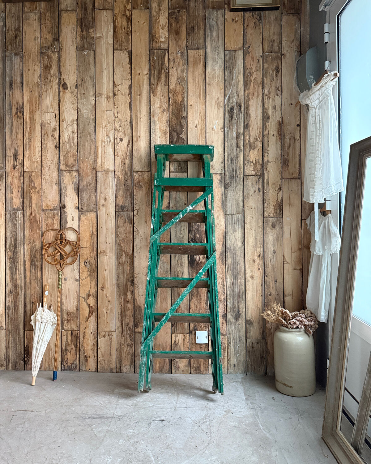 Vintage stepladder with green patina
