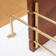 String shelf in teak and gold metal