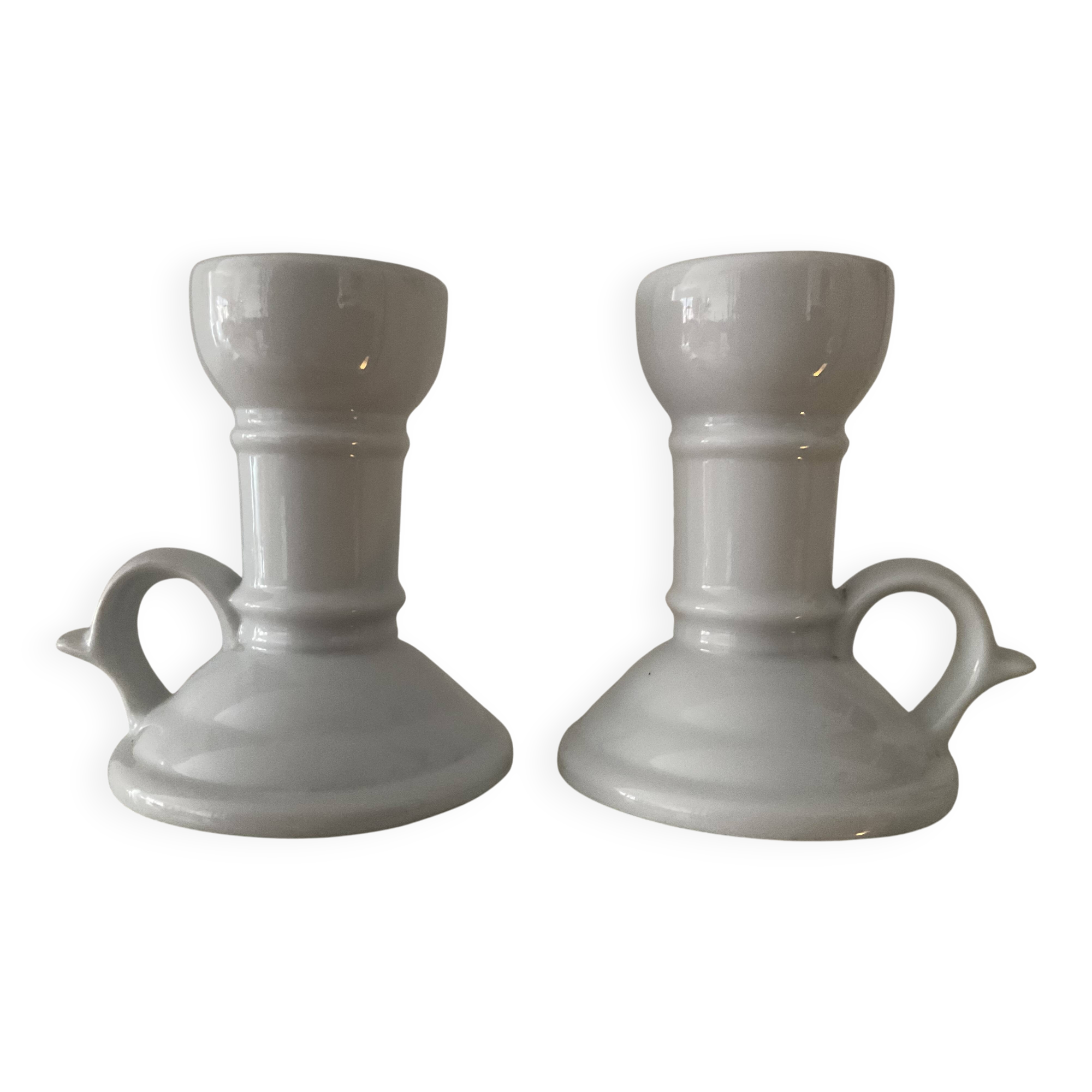 Pair of vintage cellar rat porcelain candlesticks