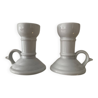 Pair of vintage cellar rat porcelain candlesticks