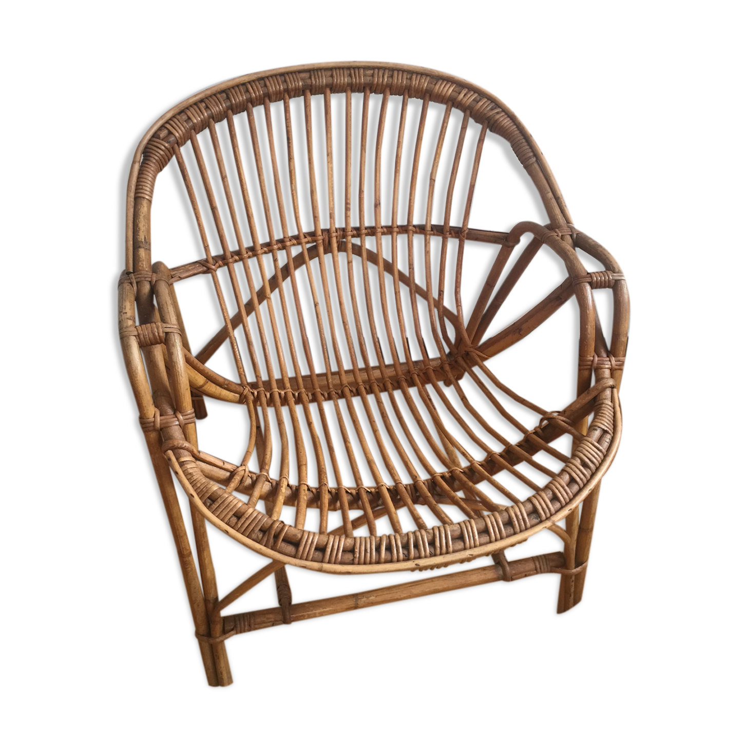 Shell rattan armchair