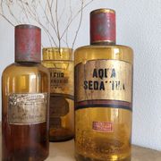 Old bottle of pharmacy "aqua sedativa" brown glass