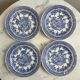 Set of four flat plates from English earthenware.