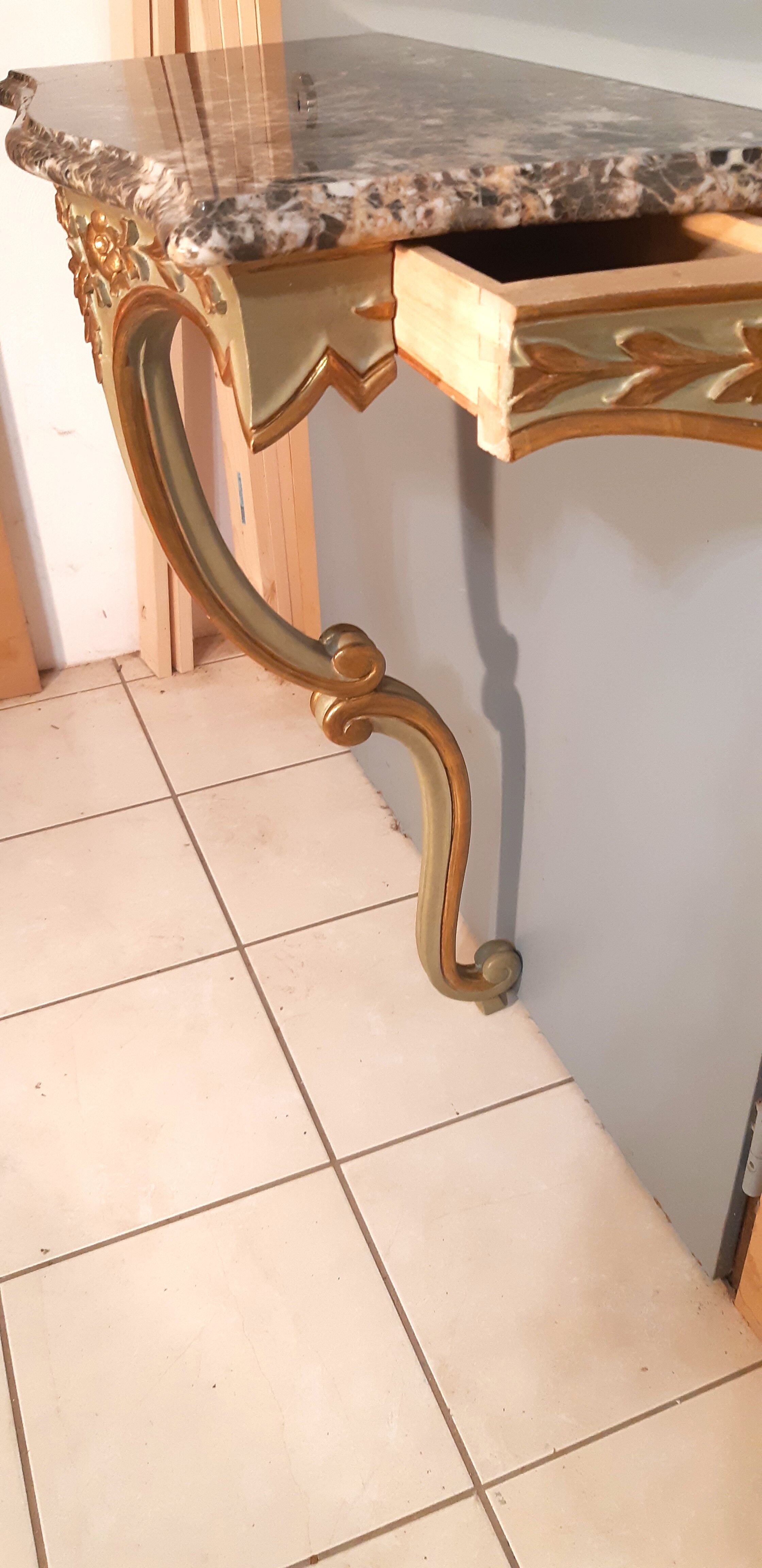 Louis XV style wall lamp console, twentieth century, wood and gilded stucco marble top