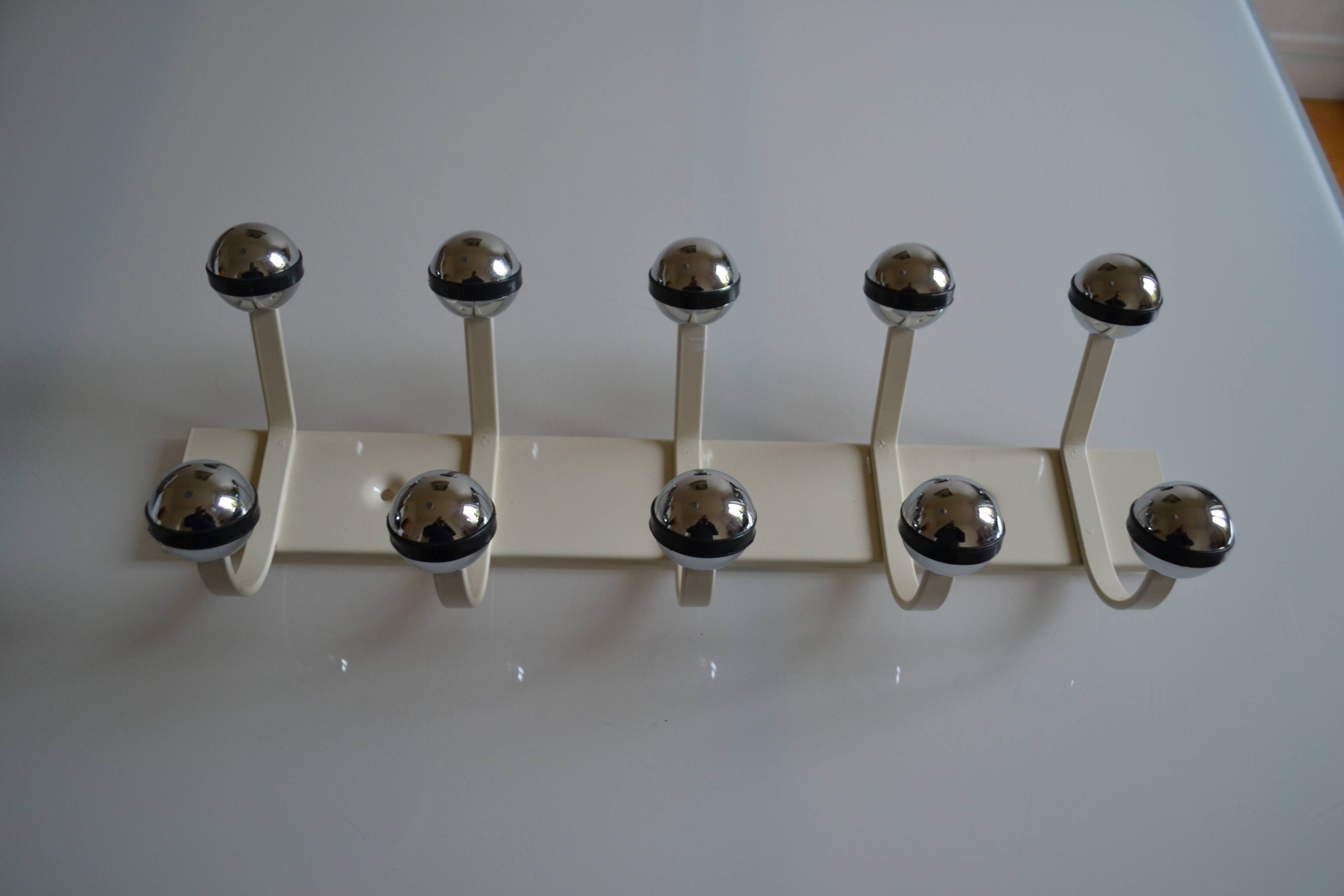 Vintage 1970s wall-mounted coat rack with 10 hooks