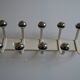 Vintage 1970s wall-mounted coat rack with 10 hooks