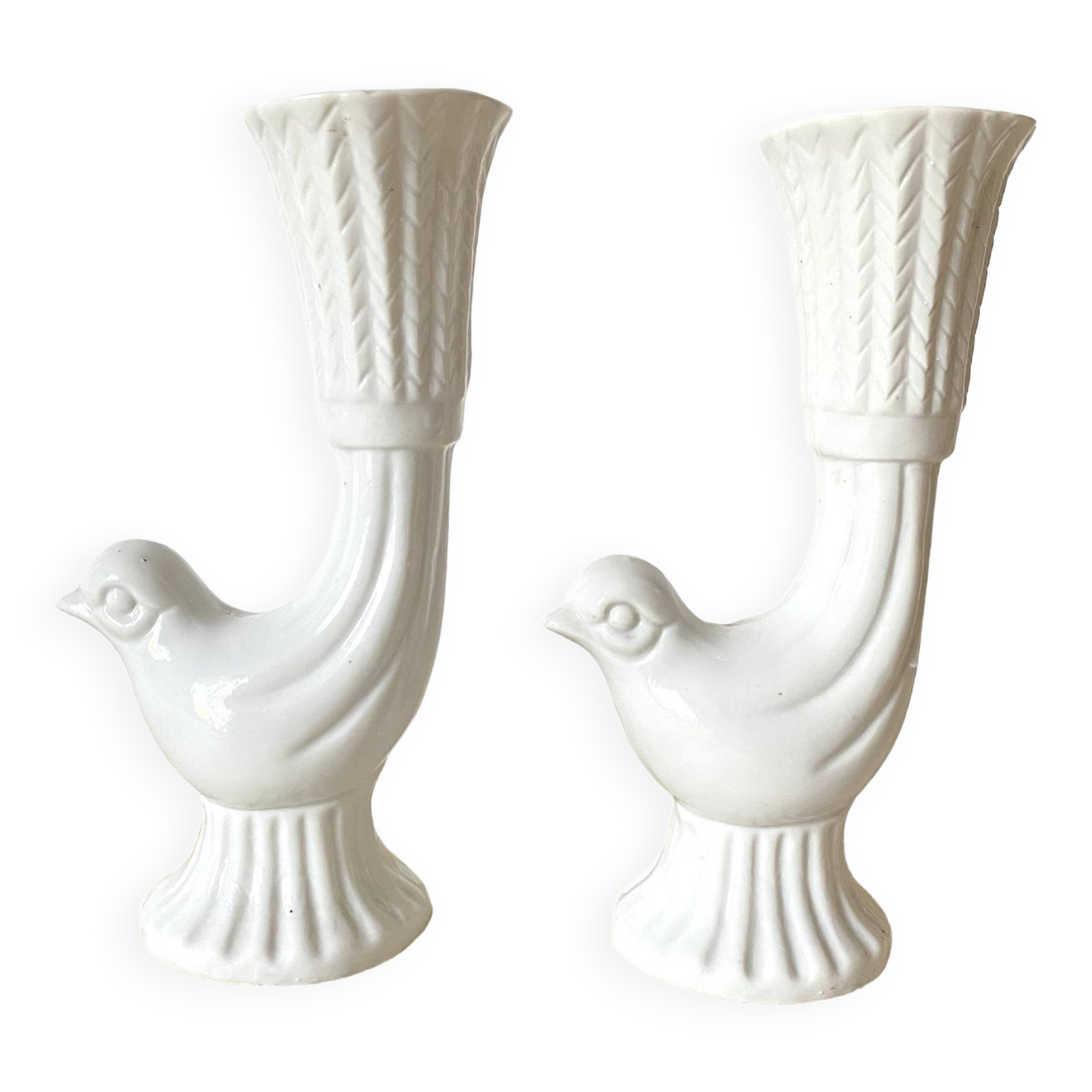 Pair of porcelain candle holders and bird vases