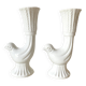 Pair of porcelain candle holders and bird vases
