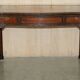 WARING & GILLOW library desk in the style of Thomas Chippendale with a leather top.