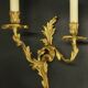 Large pair of stamped wall sconces in Louis XV style - gilded bronze