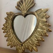 Golden ex-voto wall heart
