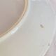 Yellow porcelain plate with saturated and vivid colors. Handmade in Japan