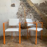 Pair of postmodern orange armchairs and bouclé wool fabric