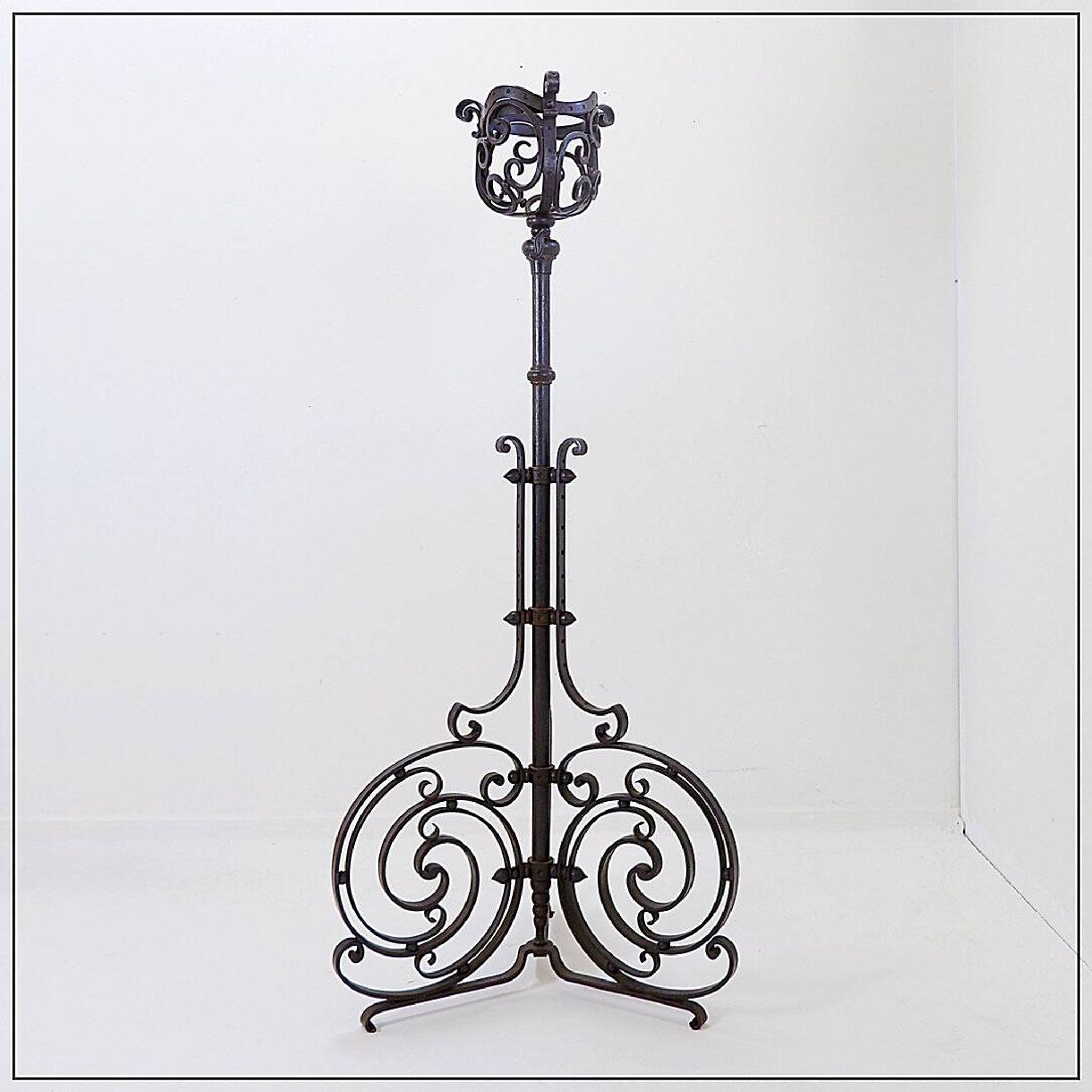 Art Nouveau Wrought iron tripod floor candlestick
