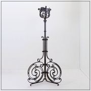 Art Nouveau Wrought iron tripod floor candlestick