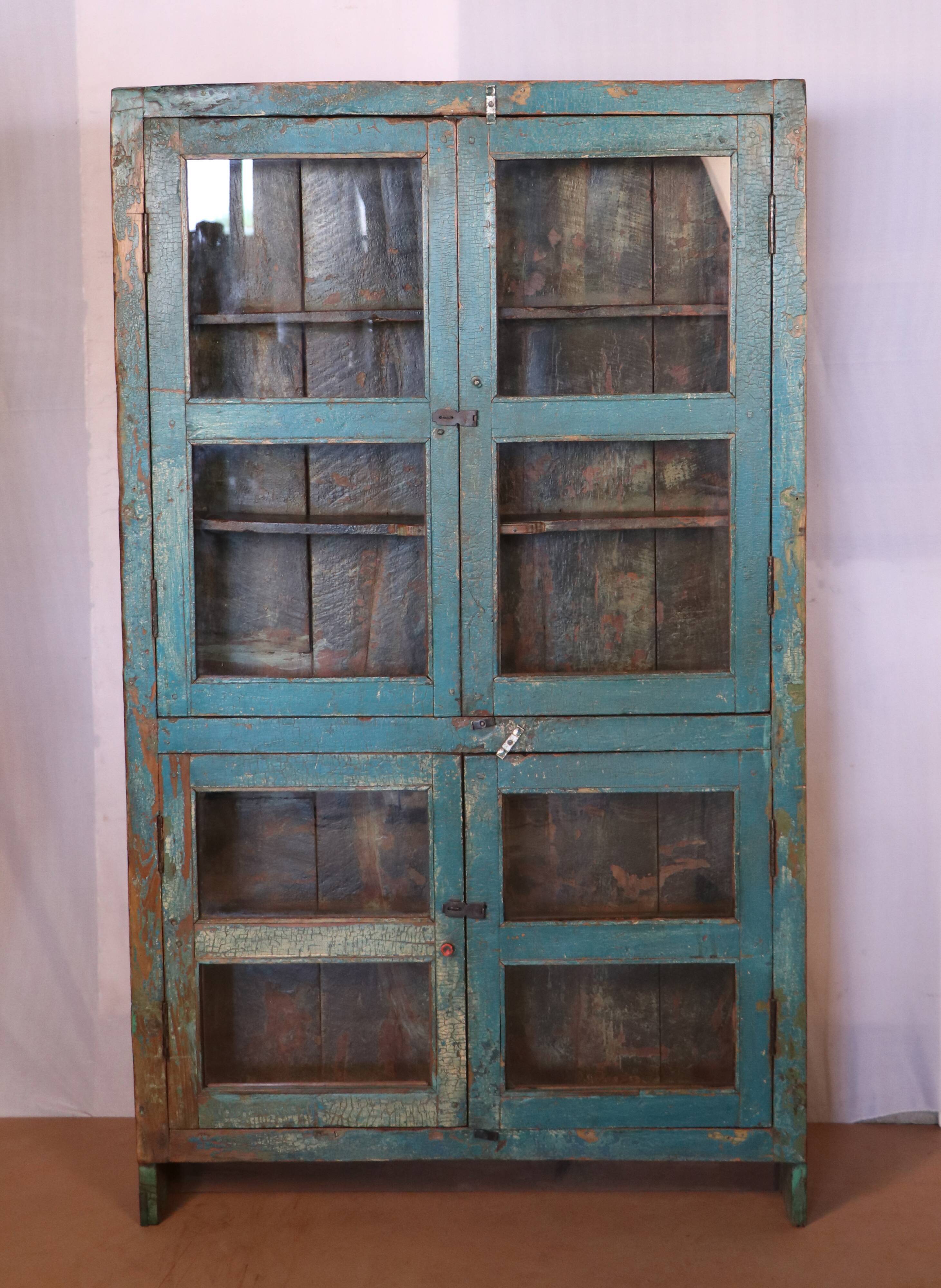 Old showcase in original blue patina Burmese teak
