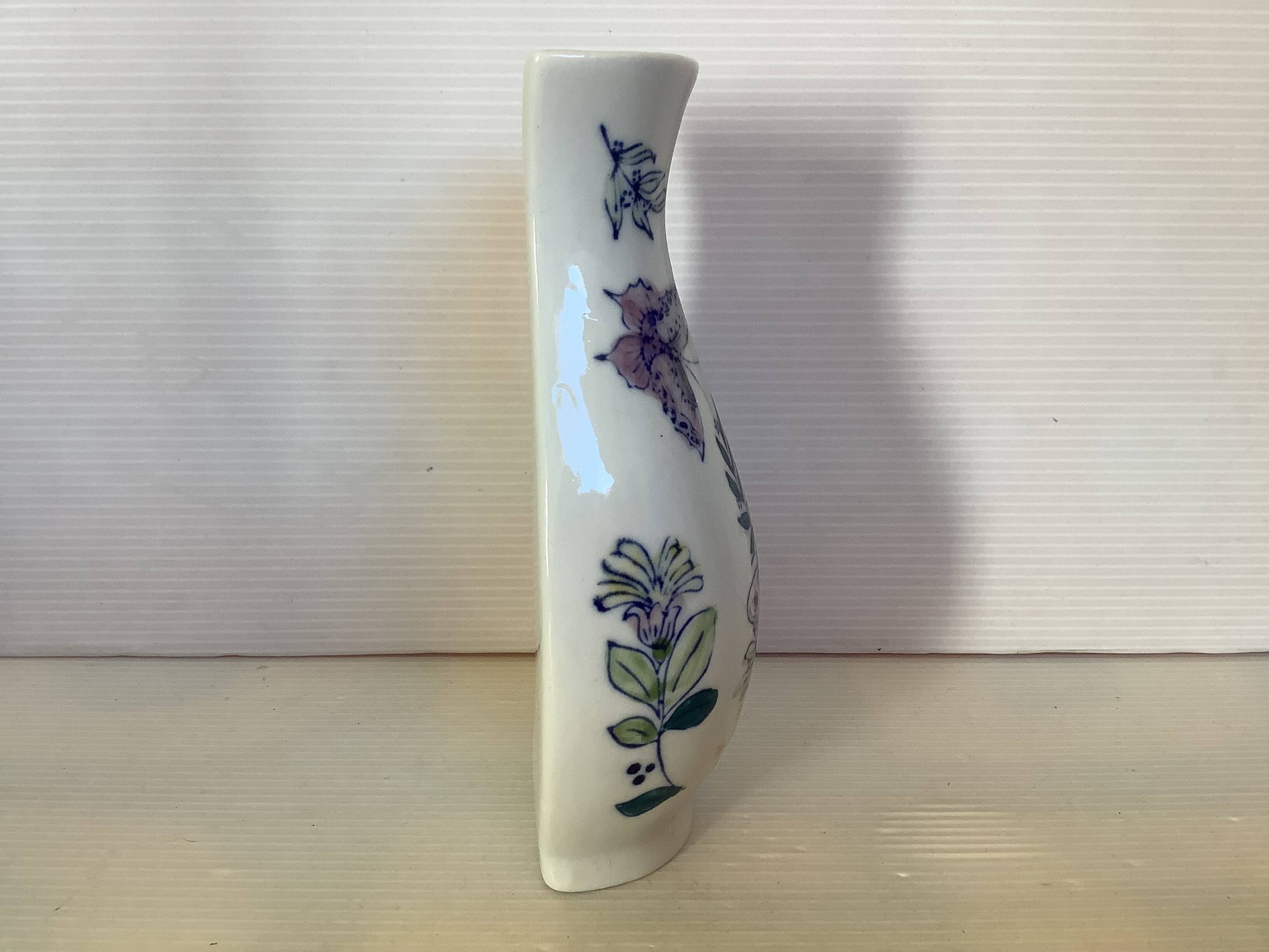 Flower vase with butterflies