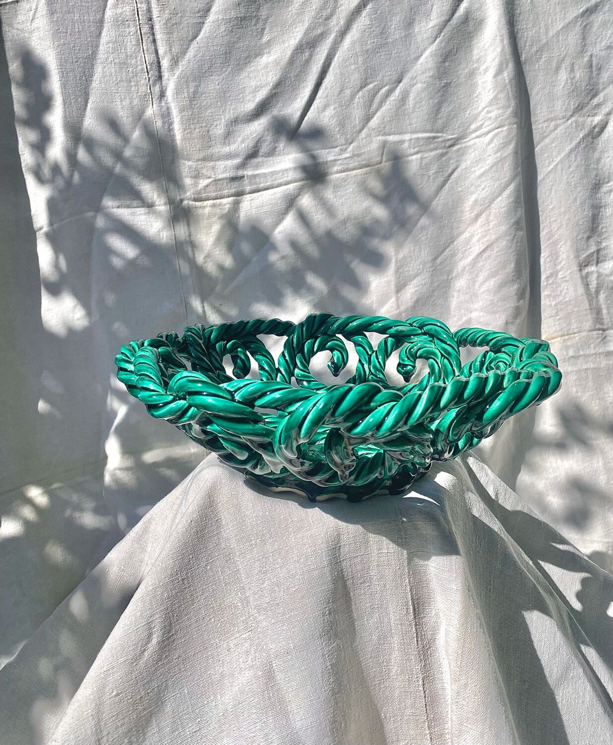 Large twisted green enamelled bowl