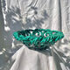 Large twisted green enamelled bowl