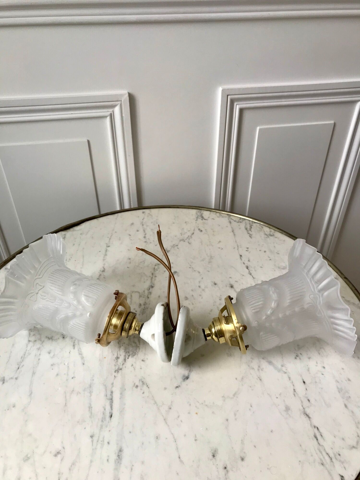 Pair of tulip wall lamps in molded glass on porcelain support 20s