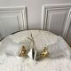 Pair of tulip wall lamps in molded glass on porcelain support 20s