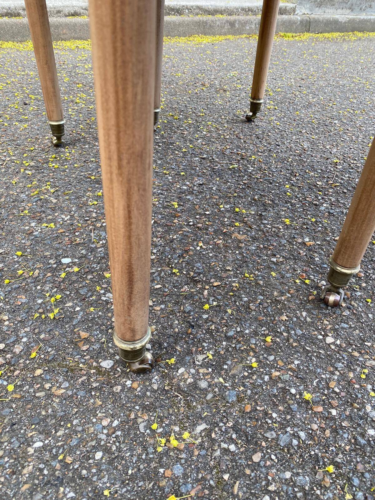 Renovated Louis Philippe round extendable dining table with leaves from the 18th century.