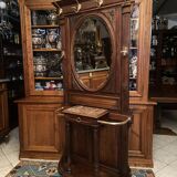 Solid walnut vestibule coat rack with oval mirror and bronze hooks
