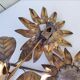Paire d’appliques fleurs, cuivre et étain. Vintage