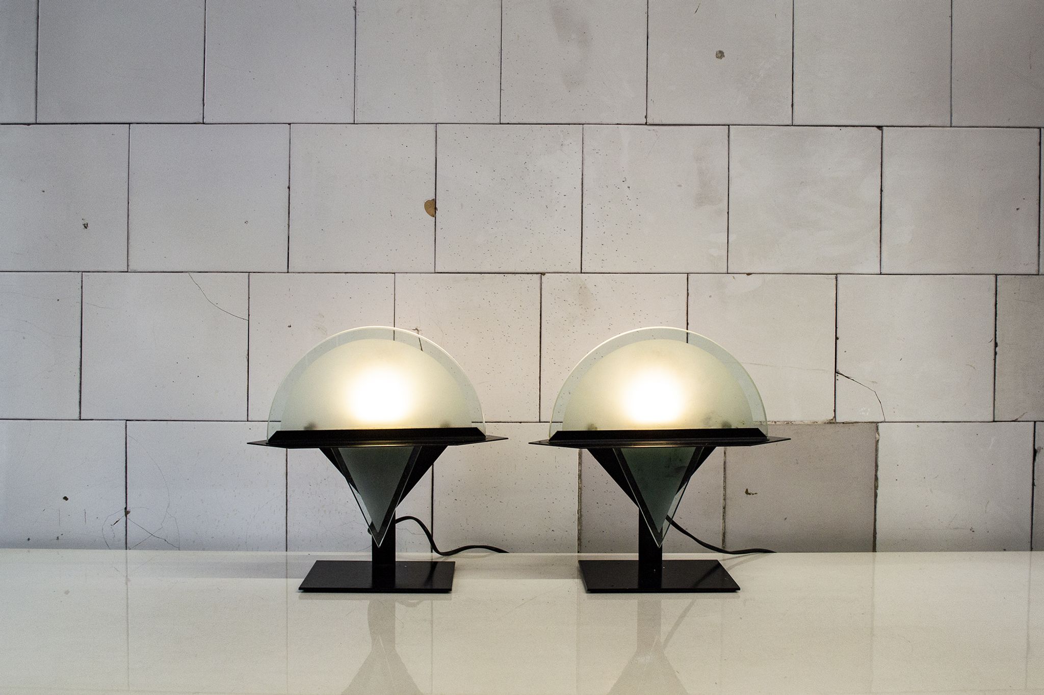 Pair of postmodern lamps with iron structure and lampshade in satin glass Italy 80s