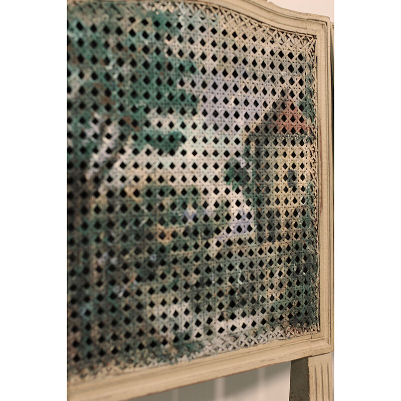 Pair of caned chairs